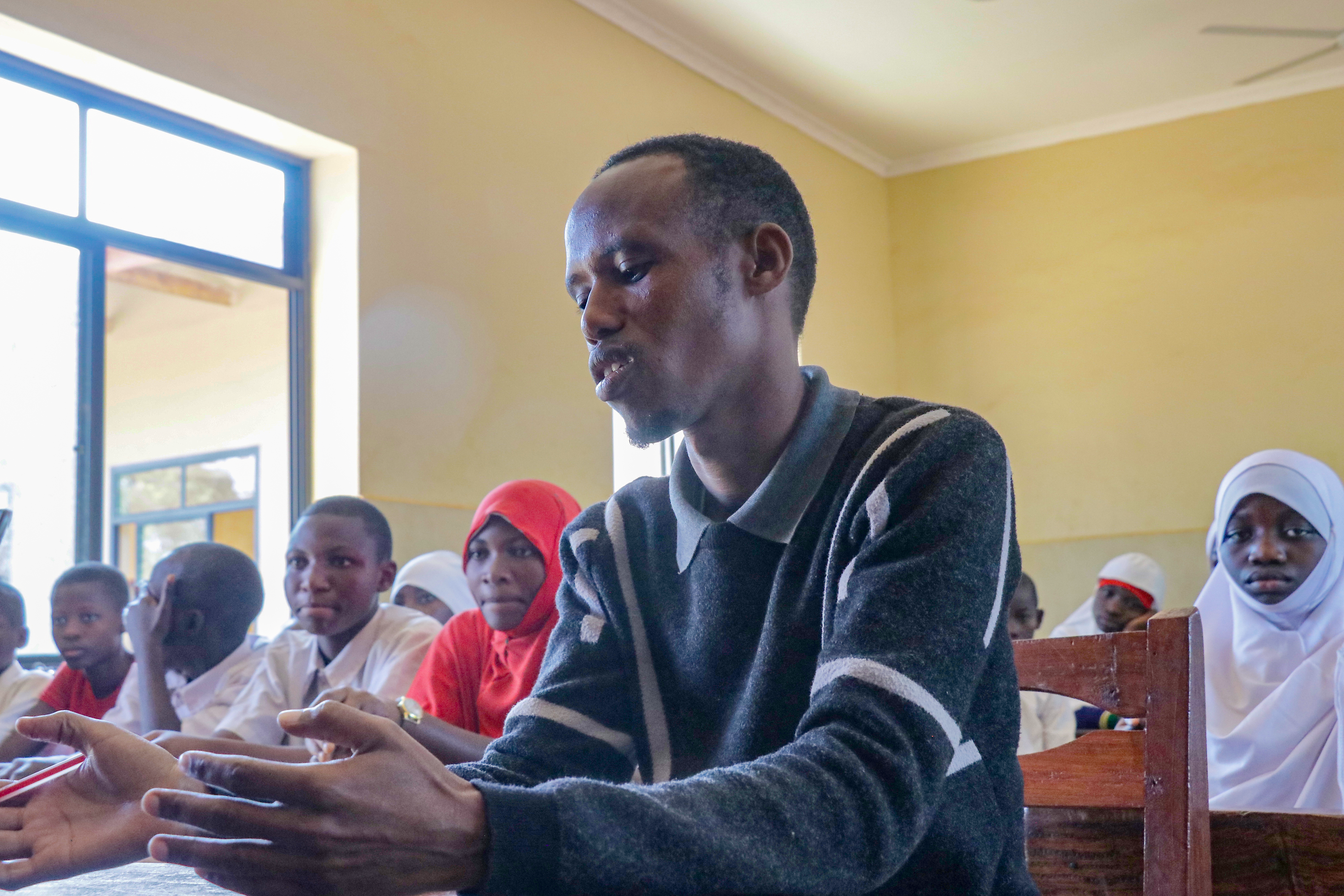 IMA World Health advances population, health and environmental education with youth through the MOMENTUM Integrated Health Resilience project in Tanzania.