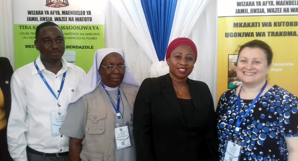 IMA staff with Tanzania Ministry of Health officials