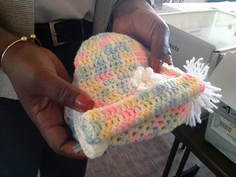 Josephine Titanji, whose family is from Cameroon, made 20 hats to be included in IMA World Health Safe Motherhood Kits™.