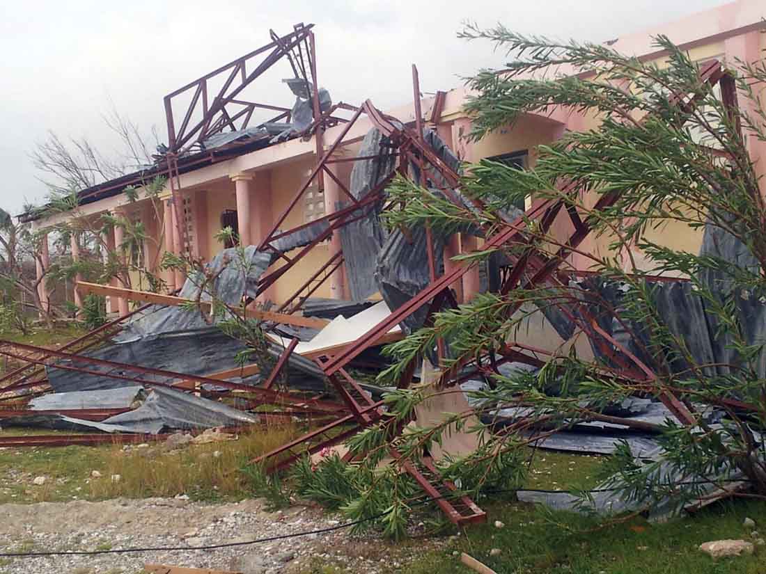 Hurricane Matthew tore the roof off a newly repaired latrine and damaged a new fence